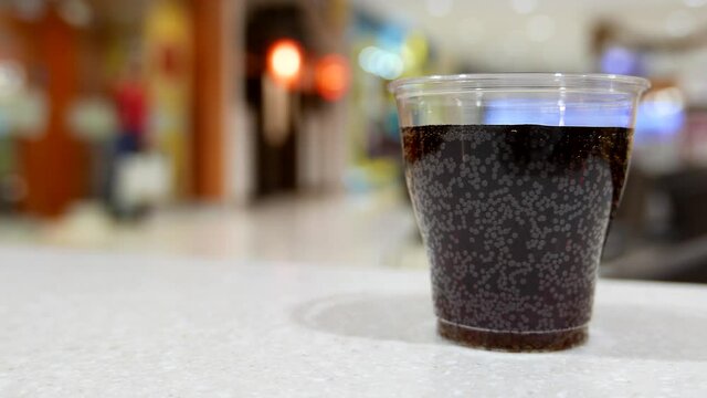 Beverage on a Shopping Mall Table