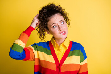 Photo of lady look empty space finger scratch head stupid face wear rainbow pullover isolated...