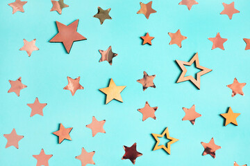 Christmas pattern made of stars on blue background