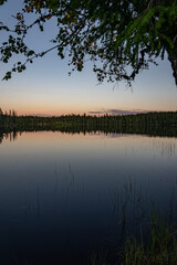 Fototapeta na wymiar sunset reflection on lake in norway