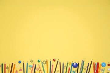 Bright stationery on yellow background, flat lay. Space for text