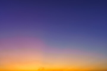 Obraz premium blue bright dramatic sunset sky in countryside or beach colorful cloudscape texture air background.