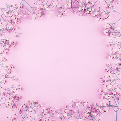 Obraz na płótnie Canvas Beautiful flower frame of gypsophila flowers. Flat lay, top view. Floral pattern.