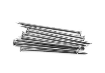 Pile of metal nails on white background, top view