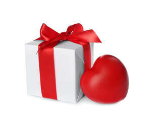 Beautiful gift box and red heart on white background. Valentine's Day celebration