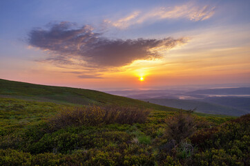 Fototapeta na wymiar Spring sunrise in the mountains. Bieszczady National Park, Poland 