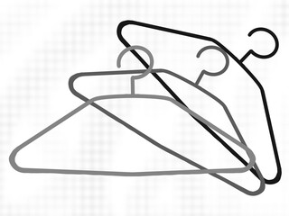 Fototapeta premium Three hangers for clothes in grayish minimalistic style.