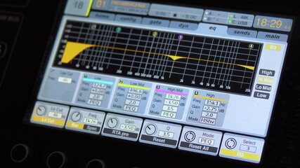 Sound tuning on a professional electronic mixer. Control panel for tuning sound channels. Monitor...