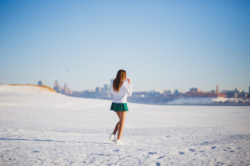 a girl on a frozen river