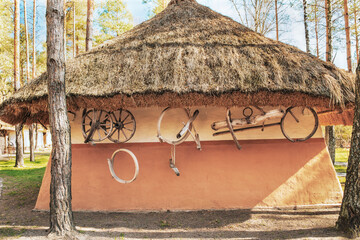 Fragment of a peasant hut under a thatched roof from the Poltava region. Parts for the operation of...