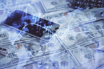 Double exposure of forex graph drawing over us dollars bill background. Concept of financial markets.