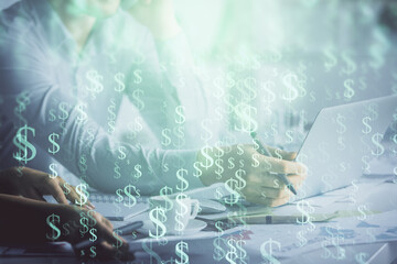 Multi exposure of man and woman working together and financial chart hologram. Business concept. Computer background.