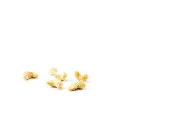 Appetizing and healthy dried cashew nuts on a white background