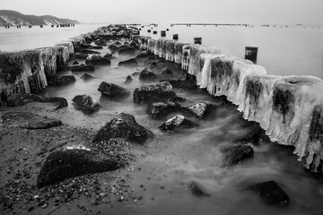 breakwater in the baltic sea, black and white photo