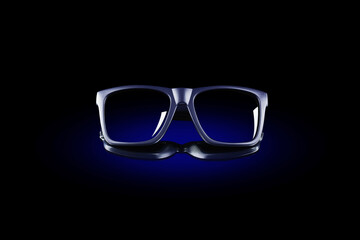Dark classical sunglasses in circle of blue light on black reflective surface