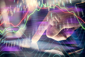 Multi exposure of man's hands holding and using a phone and financial chart drawing. Market analysis concept.