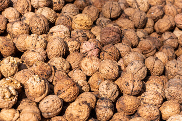 Heap of walnuts on a market stall in Chengdu, Sichuan province, China