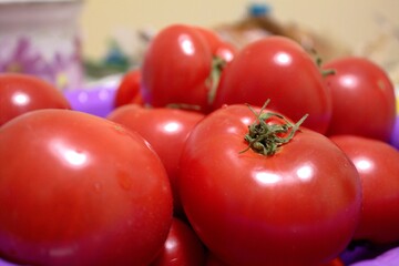 Bright fresh tomatoes playing with light.