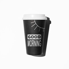 Disposable coffee cup, flat lay. Hand drawn Sun and text Good Morning on the glass. Invigorating drink in the morning concept