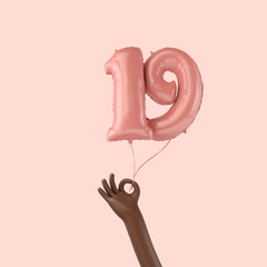 Hand holding a 19th birthday pink foil celebration balloon. 3D Rendering