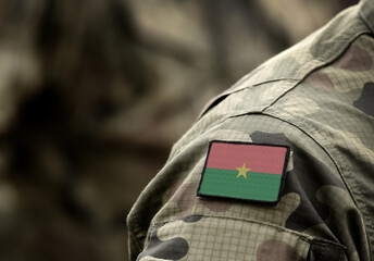 Flag of Burkina Faso on military uniform. Army, troops, soldiers, Africa, (collage).