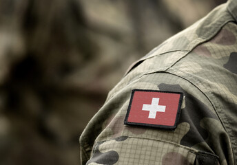 Flag of Switzerland on military uniform. Swiss flag on soldiers arm. Armed Forces, Army. Collage.