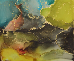 Abstract yellow, blue and gold glitter color background. Marble texture. Alcohol ink colors.