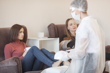 Obraz premium Woman making pedicure. Beauty procedure in salon.