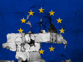 Flag of the European Union painted on a broken wall.