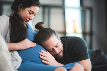 pregnant woman with her husband couple at home, family person pregnancy motherhood concept