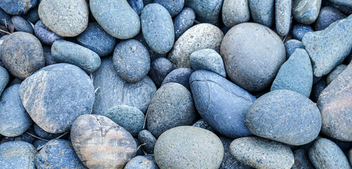 Pebbles stone or river stone  background with vintage filter 