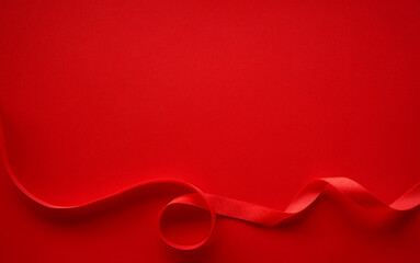 Red paper with red satin ribbon frame, Love or Gift background 