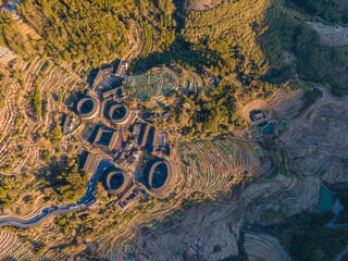 Aerial view of a village with Tulou, a traditional Chinese architecture in Fujian province, China.