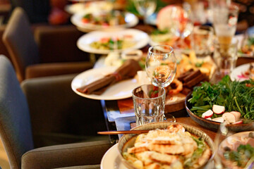 Served table set at restaraunt in the evening