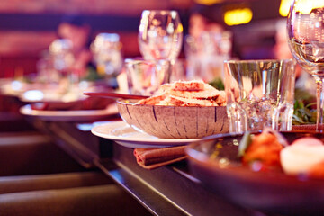 Served table set at restaraunt in the evening