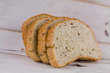 a sliced bread on a wooden table