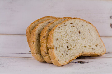 a sliced bread on a wooden table