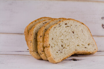 a sliced bread on a wooden table
