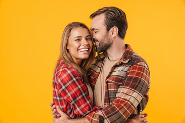 Beautiful happy couple hugging and smiling at each other