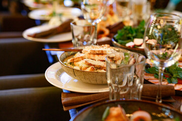 Served table set at restaraunt in the evening