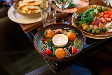 Served table set at restaraunt in the evening