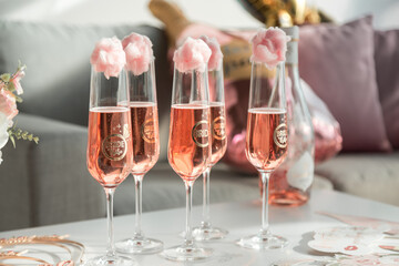 Champagne glasses
 covered with cotton candy in the style of the bride's bachelorette party.
