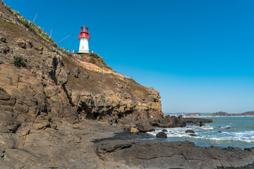 The lighthouse at the coast of the Volcanic island at Zhangzhou, Fujian province, China.