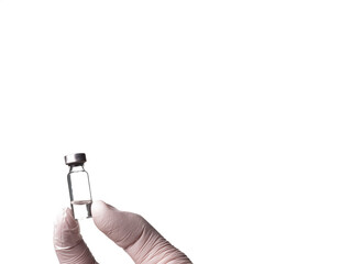 A glass vial in which a liquid with a vaccine is in the doctor's hand.