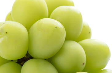 Beautiful a bunch of Shine Muscat green grape isolated on white background.