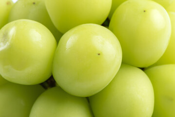 Beautiful a bunch of Shine Muscat green grape isolated on white background.