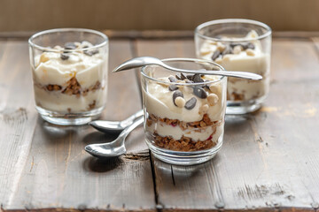 delicious layered dessert of muesli and fruit yogurt decorated with chocolate