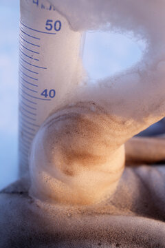 Violent chemical reaction in a measuring cylinder of hydrogen peroxide decomposition with the formation of a large amount of foam.