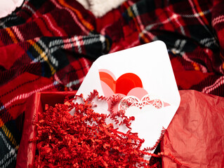 Red hearts on soft plaid