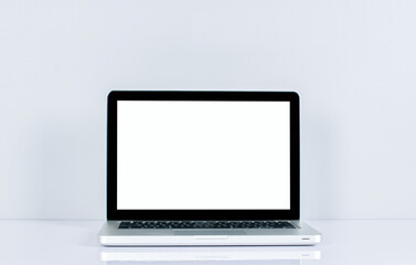 Computer monitor isolated on white screen on office style desk